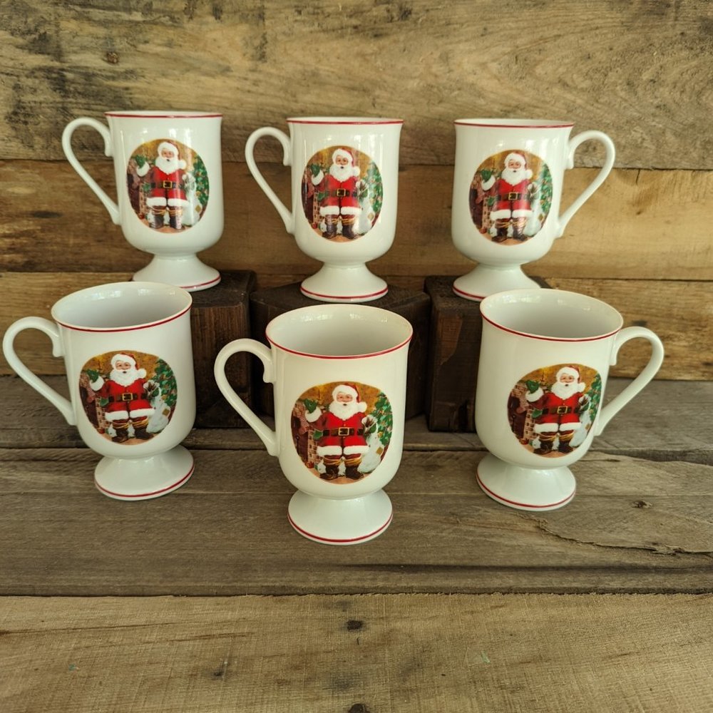 Six 8-ounce Santa Claus pedestal china mugs, by Colonial Candle of Cape Cod